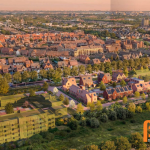 Luchtfoto van nieuwbouwproject VictoriaPark in Hoofddorp met duurzame woningen en groene omgeving